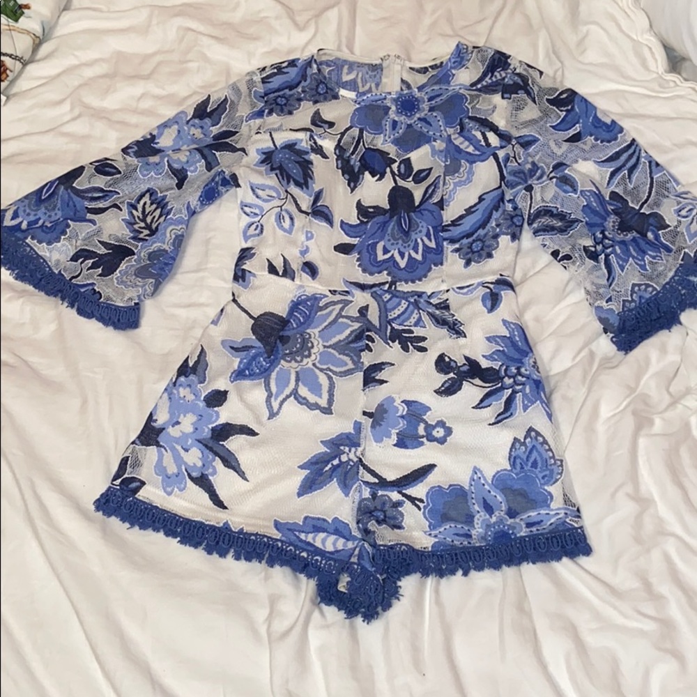 GUC Blue Floral Romper sz small!